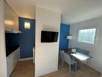 Télévision ou salle de divertissement dans l'établissement Villages Clubs du Soleil - SOUSTONS