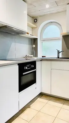 Cuisine ou kitchenette dans l'établissement Appartement La Gravière
