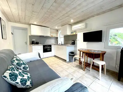 Cuisine ou kitchenette dans l'établissement Appartement La Gravière