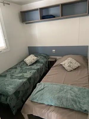 Un ou plusieurs lits dans un hébergement de l'établissement Mobilhome 516