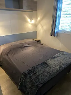 Un ou plusieurs lits dans un hébergement de l'établissement Mobilhome 516