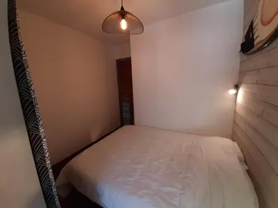 Un ou plusieurs lits dans un hébergement de l'établissement Appartement cosy, 4 pers, proche plages et centre, BBQ, parking, Wifi inclus - FR-1-239-943