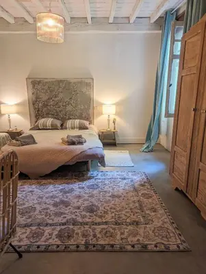 Un ou plusieurs lits dans un hébergement de l'établissement Maison Pimoli : Chambre Hortense
