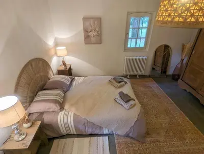 Un ou plusieurs lits dans un hébergement de l'établissement Maison Pimoli : Chambre Garance