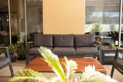 Coin salon dans l'établissement Villa Hibiscus à 10 min de l'océan