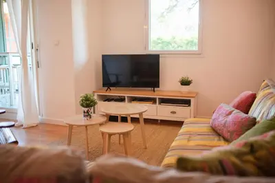 Télévision ou salle de divertissement dans l'établissement Duplex familial proche plage et commerces