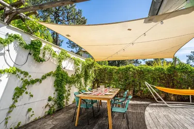 Jardin de l'établissement Villa Amandine - Charmante maison de famille au Pyla