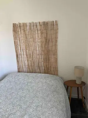 Un ou plusieurs lits dans un hébergement de l'établissement Appartement rénové au Penon