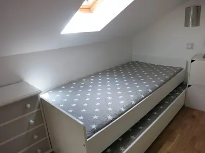 Un ou plusieurs lits dans un hébergement de l'établissement Gîte O 3 Cèdres