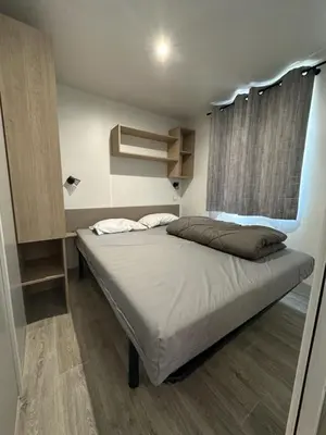 Un ou plusieurs lits dans un hébergement de l'établissement Mobil-home