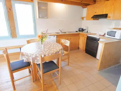 Cuisine ou kitchenette dans l'établissement Gite vert
