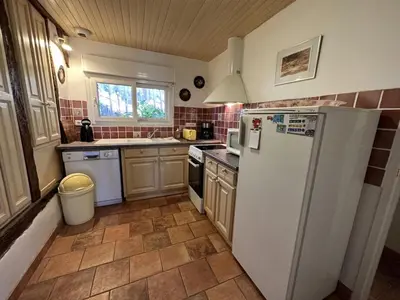 Cuisine ou kitchenette dans l'établissement Petit rimbez