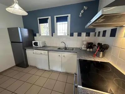 Cuisine ou kitchenette dans l'établissement Albret
