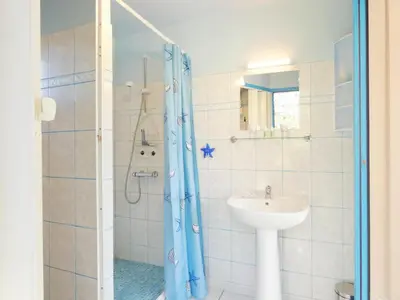 Salle de bains dans l'établissement Gite des pignons