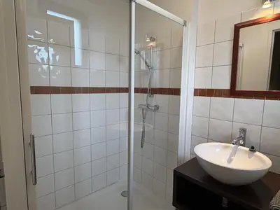 Salle de bains dans l'établissement Le gite du barbe