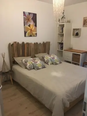 Un ou plusieurs lits dans un hébergement de l'établissement Charmant appartement 42m2 pour location de vacances Seignosse