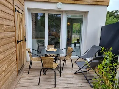 Terrasse ou espace extérieur de l'établissement La Cabane Océan 10 min a pied de Mimizan plage Forêt