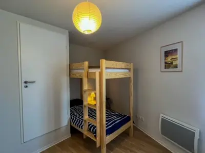 Un ou plusieurs lits dans un hébergement de l'établissement La Cabane Océan 10 min a pied de Mimizan plage Forêt