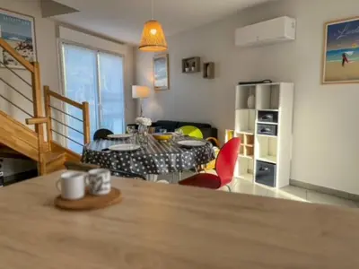 Coin salon dans l'établissement La Cabane Océan 10 min a pied de Mimizan plage Forêt