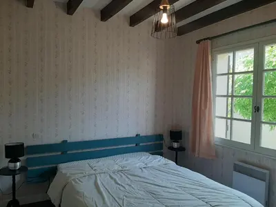 Un ou plusieurs lits dans un hébergement de l'établissement Maison 4 chambres avec jardin clos, proche plage et centre, à Vieux-Boucau - FR-1-239-964