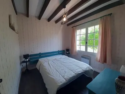 Un ou plusieurs lits dans un hébergement de l'établissement Maison 4 chambres avec jardin clos, proche plage et centre, à Vieux-Boucau - FR-1-239-964
