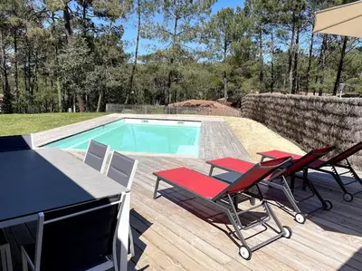 Piscine de l'établissement Maison 5 personnes avec piscine privée chauffée - Private heated pool 5 people house - Moliets-et-Maa - Landes - France ou située à proximité