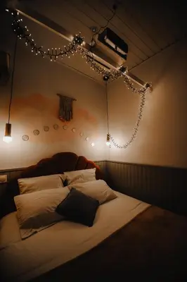 Un ou plusieurs lits dans un hébergement de l'établissement Coquillages et crustacés, Netflix baignoire îlot chez Ivona Vacances