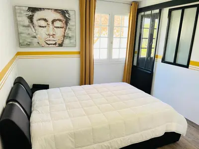 Un ou plusieurs lits dans un hébergement de l'établissement LA MAISON CACHEE-BA