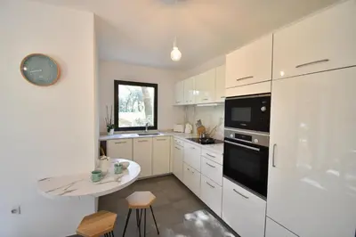 Cuisine ou kitchenette dans l'établissement Barranx - Hossegor appartement pour 4 personnes dans le centre ville