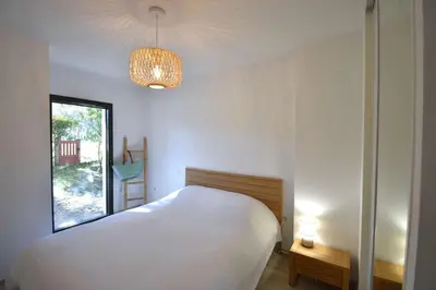Un ou plusieurs lits dans un hébergement de l'établissement Barranx - Hossegor appartement pour 4 personnes dans le centre ville
