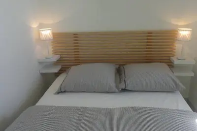 Un ou plusieurs lits dans un hébergement de l'établissement Hossegor Appartement T2 cabine - Superbe Vue Océan
