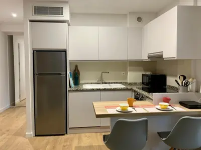 Cuisine ou kitchenette dans l'établissement Studio à côté du lac avec terrasse