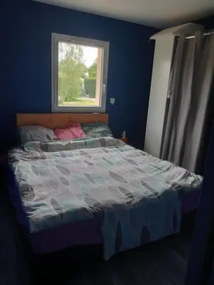 Un ou plusieurs lits dans un hébergement de l'établissement Maison 85m2 calme vue sur forêt