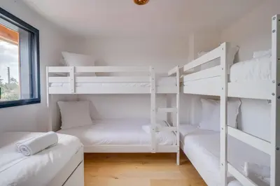 Un ou plusieurs lits dans un hébergement de l'établissement La villa tchanquée du Bassin