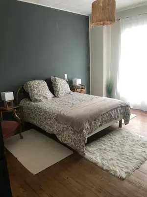 Un ou plusieurs lits dans un hébergement de l'établissement Appartement spacieux et lumineux