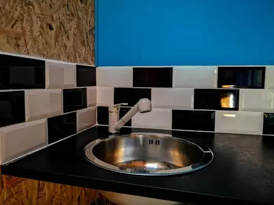 Cuisine ou kitchenette dans l'établissement Entre terre et mer