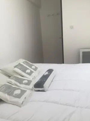 Un ou plusieurs lits dans un hébergement de l'établissement appartement T2 proche du golf et de la plage