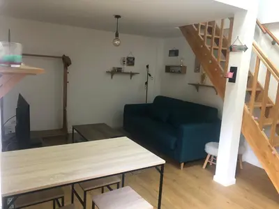 Coin salon dans l'établissement appartement T2 proche du golf et de la plage