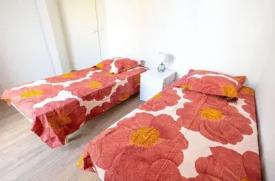 Un ou plusieurs lits dans un hébergement de l'établissement Appartement proche du lac centre ville