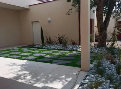Jardin de l'établissement Appartement proche du lac centre ville
