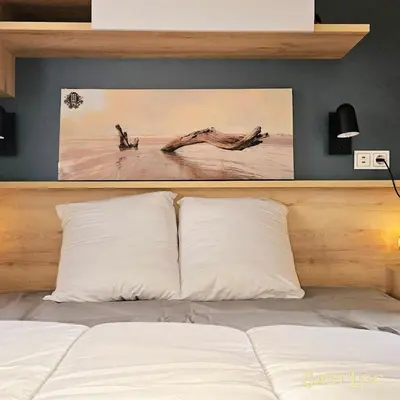 Un ou plusieurs lits dans un hébergement de l'établissement Superbe Mobil home au calme 804 camping La Réserve 4*