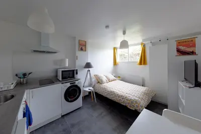 Un ou plusieurs lits dans un hébergement de l'établissement Dune Front Paradise - Appartement sur la dune
