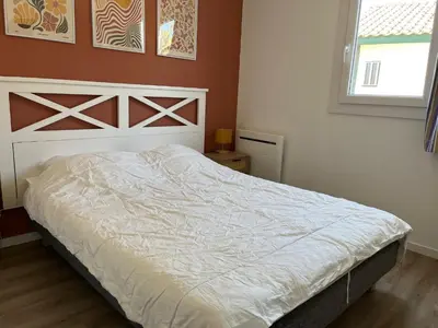 Un ou plusieurs lits dans un hébergement de l'établissement Patrimoine et immobilier Villas du Lac