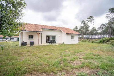 Jardin de l'établissement Entre lacs & Océan - Maison climatisée avec jardin