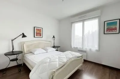 Un ou plusieurs lits dans un hébergement de l'établissement T2 4 couchages à 2 pas du Bassin