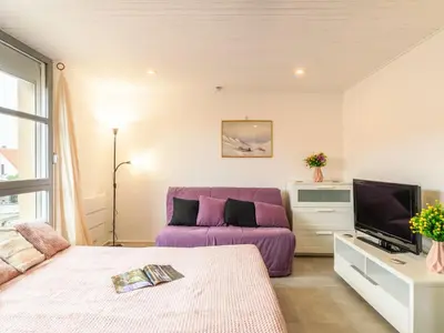 Un ou plusieurs lits dans un hébergement de l'établissement Studio Galerie Casino by Interhome