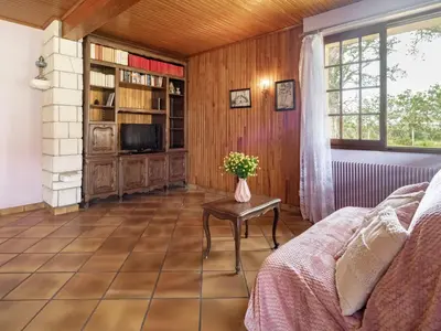 Coin salon dans l'établissement Holiday Home Maisouet by Interhome