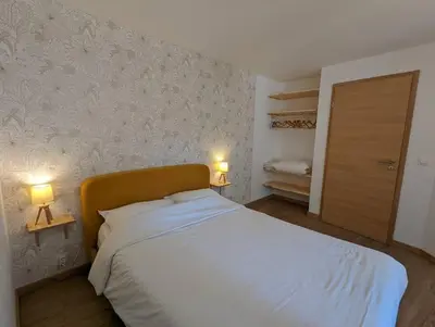 Un ou plusieurs lits dans un hébergement de l'établissement Maison Chaleureuse - Côte landaise