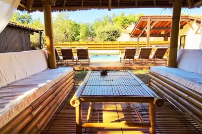 Balcon ou terrasse dans l'établissement Villa 12 personnes proche oécan, 10 vélos et 4 surf fournis, entièrement climatisée