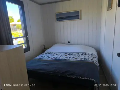 Un ou plusieurs lits dans un hébergement de l'établissement cottage familial piscine dans les Landes